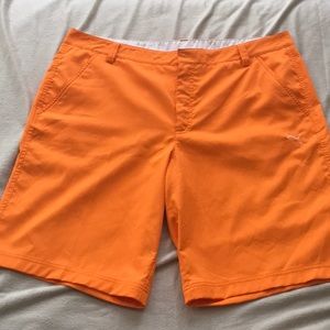 puma orange golf shorts